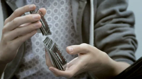 Person Shuffling a Pack of Playing Cards Stock Footage 56702471