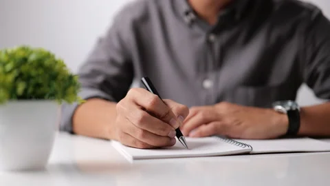 Person signing a document Stock Footage 162707574