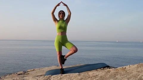 Person sitting on the beach Stock Footage 249453684