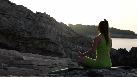 Person sitting on the beach Stock Footage 249457917
