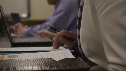 A person sitting at a desk Video stock 155533526