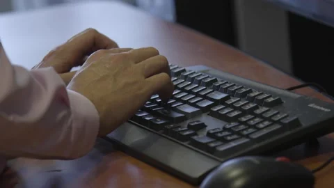 A person sitting on the keyboard of a laptop computer Stock Footage 155540689
