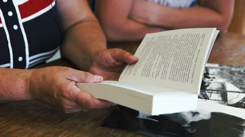 A person sitting on a table Video stock 131950337