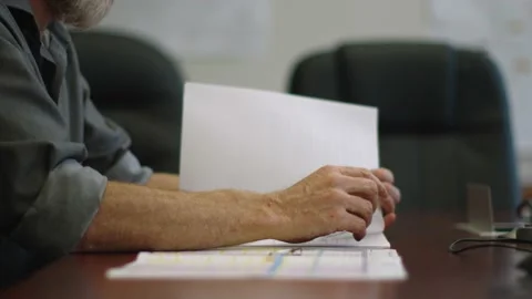 A person sitting on a table Stock Footage 155540750