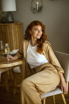 A person sitting on a table Stock Photos