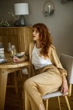A person sitting on a table Stock Photos