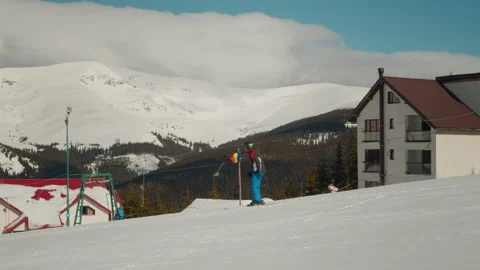 Person skiing on a downhill track doing outdoor ski exercise. Stock Footage 295888045