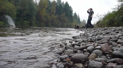 Person Skipping River Stone Stock Footage 31241679
