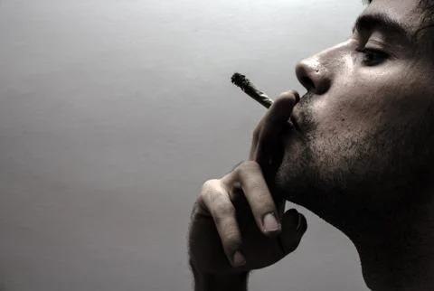 Person smoking Stock Photos