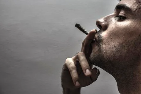Person smoking Stock Photos