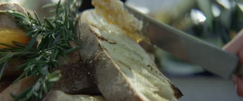 Person spreading cream on bread Stock Footage 67289461