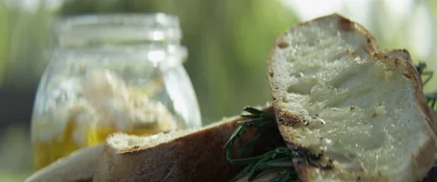 Person spreading cream on bread Stock Footage 67289467