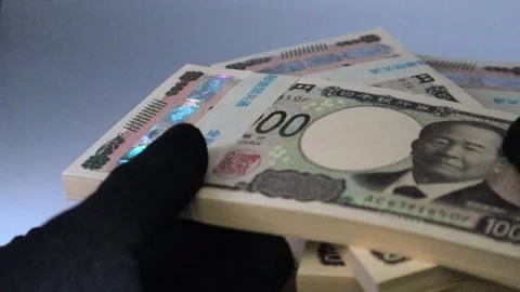 A person stacking stacks of bills Video stock 325695247