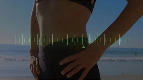 Person standing on beach with audio waveform animation over their midsection Stockbeeldmateriaal 305488174