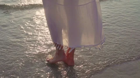 A person standing on a beach Видео 157875374