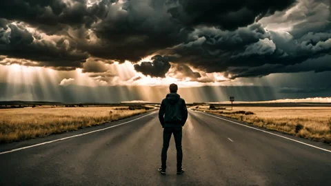 Person Standing on Empty Road Under Stormy Sky Stock Footage 275836897