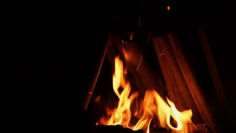 A person standing in front of a fire 库存影片 157867114
