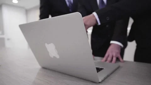 A person standing in front of a laptop Video stock 155538879