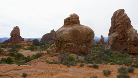 A person standing in front of a large rock Stock Footage 156014438