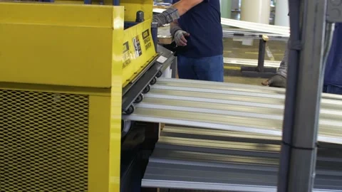 A person standing in front of a machine Stock Footage 155540546