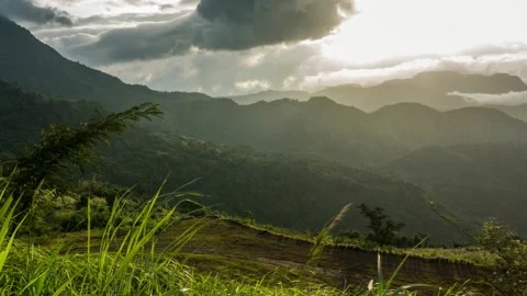 A person standing in front of a mountain 库存影片 156845121
