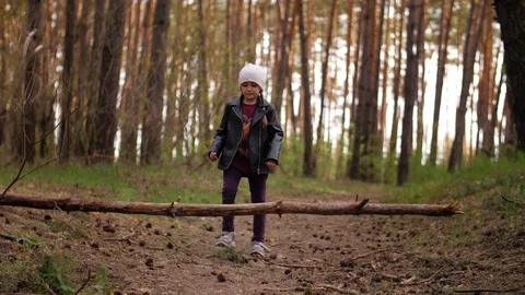 A person standing next to a tree Stock Footage 129792003