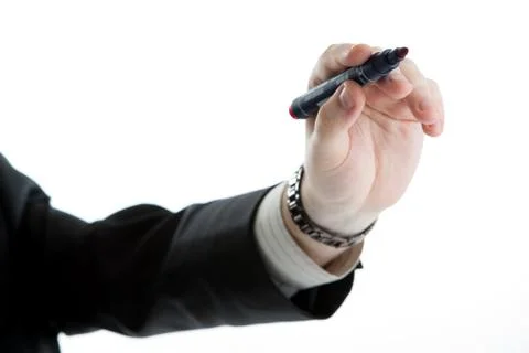 The person starts to write by marker Stock-Fotos