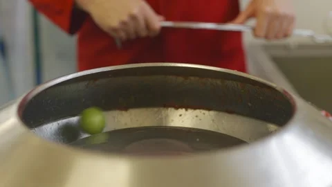 A person is stirring a pot with a spoon Stock Footage 297840859