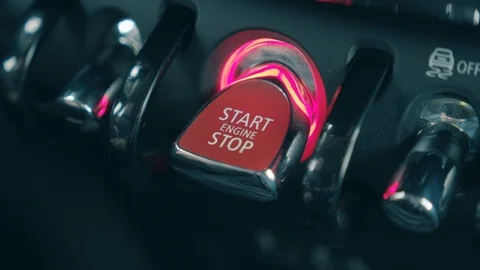 A person stops the engine by turning the switcher Stock Footage 120525950