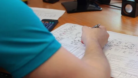 A person studies the project. Close up. Stock Footage 97776352