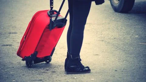 A person with a suitcase Stock-Fotos