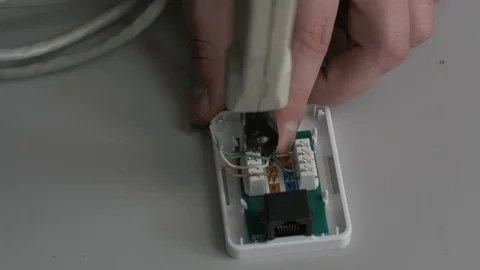 Person switching ethernet sockets Video stock 86238443