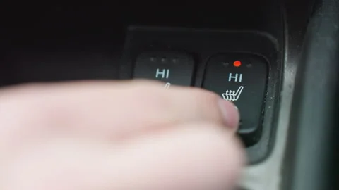 Person Switching Off Seat AC Button on Car Console with Indicator Light Stock Footage 310183451