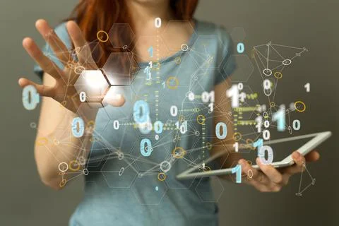 Person with a tablet tapping on a floating digital render of a binary code netwo Stock Photos