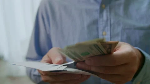 Person takes an envelope with 100 dollar banknotes. Counting hundred dollar Stock Footage 201559205