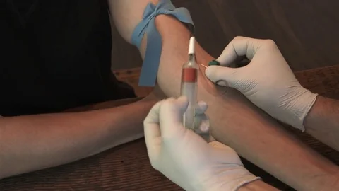 Person Taking Blood Sample Stock Footage 77973585
