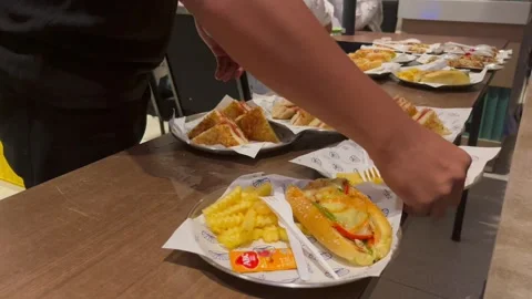 A person is taking bread on the table Video stock 314879186