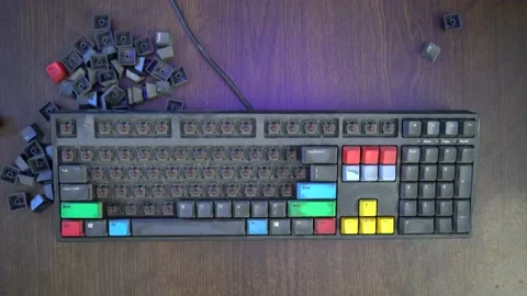 A person taking off the keys of a mechanical keyboard Stock Footage 161326058