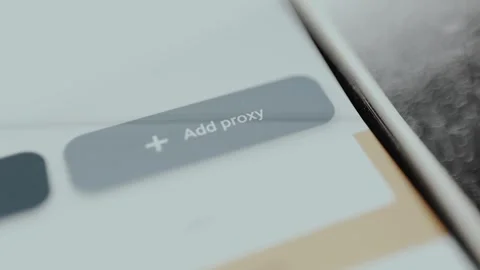 Person taps the button labeled Add proxy, internet privacy Video stock 329748271