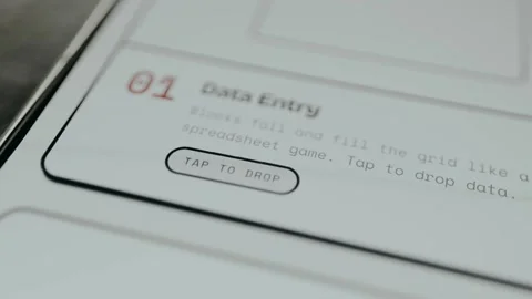 Person taps the digital button Tap to Drop from Data Entry Stock Footage 331592649