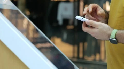 Person taps digital screen with one hand Stock-Footage 345709551