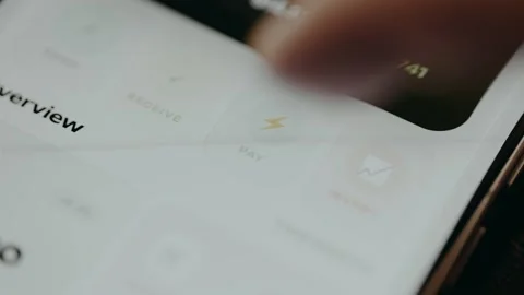 Person taps the PAY option within a banking application interface Stock Footage 331171653