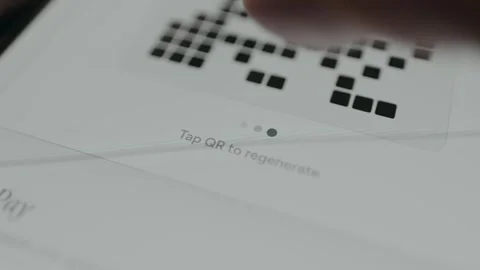 Person taps the QR code to regenerate it Stock Footage 332510997