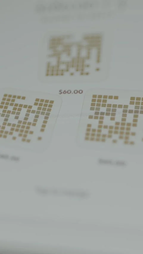 Person taps the QR code to split an amount of 180 USD to three 動画素材 332510248