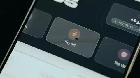 Person taps the quick access button Pay Bill from a mobile banking application Stock Footage 331171046