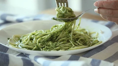 The person tastes spaghetti. Stock Footage 90994401