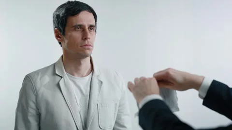 Person Tearing Up a Document and Throwing It at Man Stock Footage 295017589
