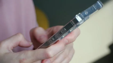 Person texting and typing on a modern smartphone Stock Footage 337892268