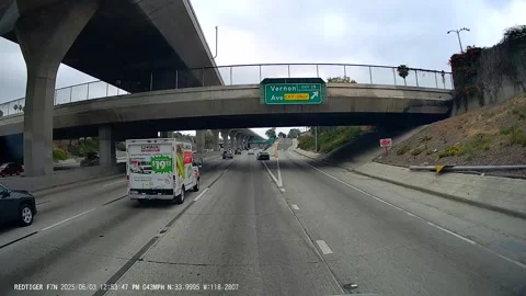 Person Throws a Large Rock on the Freeway, Los Angeles, California, USA - 10 Jun Stock Footage 311016124