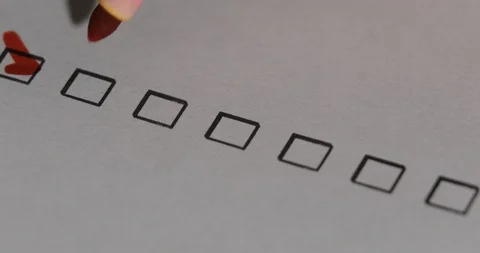 Person Ticks Checkbox Marks with a Pen, filling up To Do List. Stock Footage 127797132